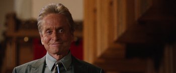 Movie still from “Last Vegas” (2013), directed by Jon Turteltaub – A man with blonde hair and a suit and tie; Close Up shot, Over the shoulder angle