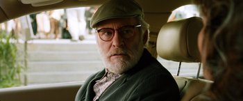 Movie still from “Last Vegas” (2013), directed by Jon Turteltaub – An older man wearing glasses and a hat; Close Up shot, Over the shoulder angle