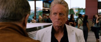 Movie still from “Last Vegas” (2013), directed by Jon Turteltaub – An older man in a white jacket and black shirt; Close Up shot, Over the shoulder angle
