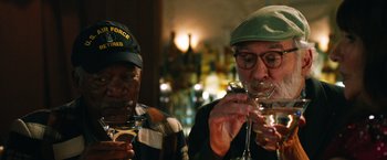 Movie still from “Last Vegas” (2013), directed by Jon Turteltaub – Two men are drinking wine at a bar; Close Up shot, Low angle