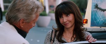 Movie still from “Last Vegas” (2013), directed by Jon Turteltaub – A woman is talking to a man on the sidewalk; Close Up shot, Over the shoulder angle