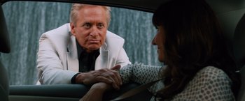 Movie still from “Last Vegas” (2013), directed by Jon Turteltaub – An older man sitting in the back of a car with a young woman; Close Up shot, Over the shoulder angle