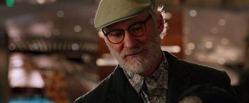 Movie still from “Last Vegas” (2013), directed by Jon Turteltaub – An older man with a beard wearing a hat; Close Up shot, Over the shoulder angle
