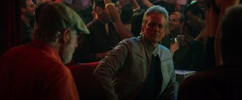 Movie still from “Last Vegas” (2013), directed by Jon Turteltaub – An older man sitting in front of an audience; Medium shot, Over the shoulder angle
