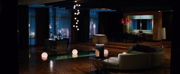 Movie still from “Last Vegas” (2013), directed by Jon Turteltaub – A living room filled with furniture next to a window; Extreme Wide shot, High angle