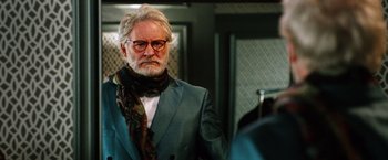 Movie still from “Last Vegas” (2013), directed by Jon Turteltaub – An older man wearing a suit and a scarf; Close Up shot, Over the shoulder angle