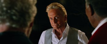 Movie still from “Last Vegas” (2013), directed by Jon Turteltaub – An older man in a white dress shirt and vest; Close Up shot, Over the shoulder angle
