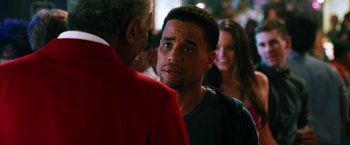 Movie still from “Last Vegas” (2013), directed by Jon Turteltaub – A man in a red jacket talking to another man in a blue shirt; Close Up shot, Over the shoulder angle