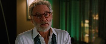 Movie still from “Last Vegas” (2013), directed by Jon Turteltaub – An older man wearing glasses and a white dress shirt; Close Up shot, Over the shoulder angle
