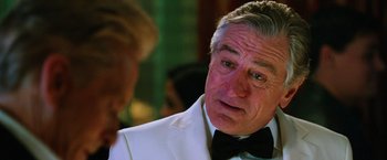 Movie still from “Last Vegas” (2013), directed by Jon Turteltaub – An older man wearing a tuxedo and a bow tie; Close Up shot, Over the shoulder angle