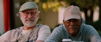Movie still from “Last Vegas” (2013), directed by Jon Turteltaub – Two older men sitting next to each other on a bench; Close Up shot, Low angle