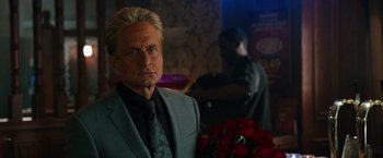 Movie still from “Last Vegas” (2013), directed by Jon Turteltaub – A person holding a bouquet of roses; Close Up shot, Over the shoulder angle