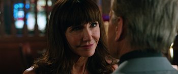 Movie still from “Last Vegas” (2013), directed by Jon Turteltaub – A person with long brown hair; Close Up shot, Over the shoulder angle