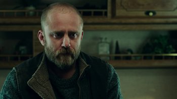 Movie still from “Leave No Trace” (2018), directed by Debra Granik – A person with a beard; Close Up shot, Low angle