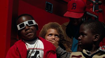 Movie still from “Lethal Weapon” (1987), directed by Richard Donner – A group of people standing next to each other; Close Up shot, Low angle