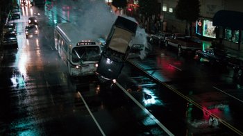 Movie still from “Lethal Weapon” (1987), directed by Richard Donner – A bus that is on the side of the street; Extreme Wide shot, High angle