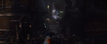 Movie still from “Kingsman: The Golden Circle” (2017), directed by Matthew Vaughn – A view of a building from the floor of the building; Extreme Wide shot, High angle