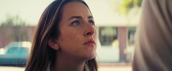 Movie still from “Licorice Pizza” (2021), directed by Paul Thomas Anderson – A person looking up at the sky; Close Up shot, Low angle