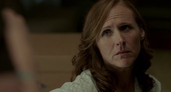 Movie still from “Life After Beth” (2014), directed by Jeff Baena – A person with long brown hair; Close Up shot, Over the shoulder angle