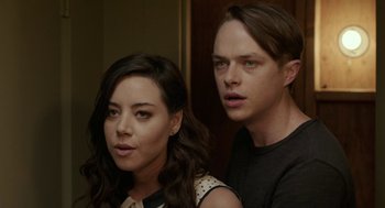 Movie still from “Life After Beth” (2014), directed by Jeff Baena – A man and a woman standing next to each other; Close Up shot, Over the shoulder angle