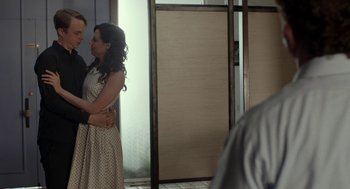 Movie still from “Life After Beth” (2014), directed by Jeff Baena – A man and a woman dancing together in a room; Medium shot, Over the shoulder angle