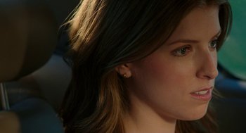 Movie still from “Life After Beth” (2014), directed by Jeff Baena – A woman's face with long brown hair; Close Up shot, Over the shoulder angle