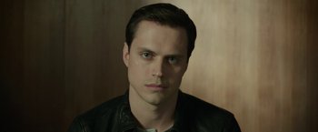 Movie still from “Life Itself” (2018), directed by Dan Fogelman – A person wearing a leather jacket; Close Up shot, High angle