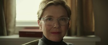 Movie still from “Life Itself” (2018), directed by Dan Fogelman – A person wearing glasses and a sweater; Close Up shot, Low angle