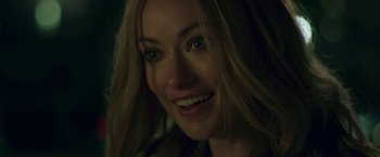 Movie still from “Life Itself” (2018), directed by Dan Fogelman – A woman smiling for the camera; Close Up shot, Over the shoulder angle