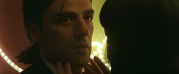 Movie still from “Life Itself” (2018), directed by Dan Fogelman – A person touching his face; Close Up shot, Over the shoulder angle