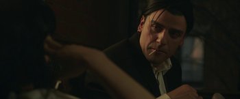 Movie still from “Life Itself” (2018), directed by Dan Fogelman – A man sitting in front of a mirror smoking a cigarette; Close Up shot, Over the shoulder angle