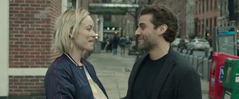 Movie still from “Life Itself” (2018), directed by Dan Fogelman – A man and a woman standing next to each other on a sidewalk; Close Up shot, Over the shoulder angle