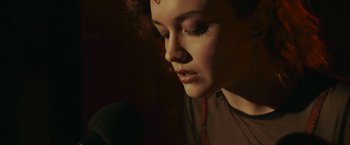 Movie still from “Life Itself” (2018), directed by Dan Fogelman – A person with her eyes closed; Close Up shot, Low angle