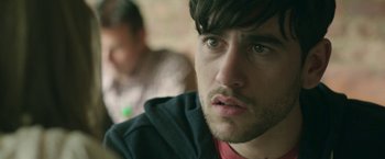 Movie still from “Life Itself” (2018), directed by Dan Fogelman – A man's face as he stares into the distance; Close Up shot, Over the shoulder angle