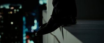 Movie still from “Limitless” (2011), directed by Neil Burger – A person's foot on top of a ledge; Close Up shot, Low angle