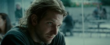 Movie still from “Limitless” (2011), directed by Neil Burger – A person with long blonde hair; Close Up shot, Over the shoulder angle