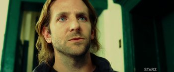 Movie still from “Limitless” (2011), directed by Neil Burger – A person with long hair; Close Up shot, Low angle