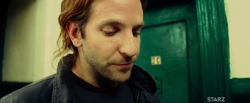 Movie still from “Limitless” (2011), directed by Neil Burger – A person with his eyes closed; Close Up shot, Low angle
