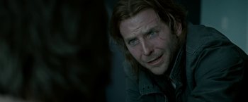 Movie still from “Limitless” (2011), directed by Neil Burger – A person with long brown hair; Close Up shot, Over the shoulder angle