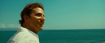 Movie still from “Limitless” (2011), directed by Neil Burger – A person near a body of water; Close Up shot, Low angle