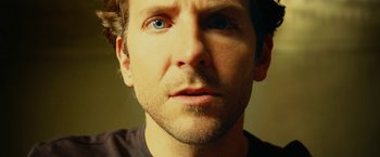 Movie still from “Limitless” (2011), directed by Neil Burger – A man's face with blue eyes; Extreme Close Up shot, Low angle