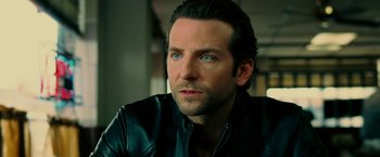 Movie still from “Limitless” (2011), directed by Neil Burger – A person wearing a leather jacket; Close Up shot, Over the shoulder angle