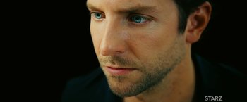 Movie still from “Limitless” (2011), directed by Neil Burger – A man's face with blue eyes; Close Up shot, High angle