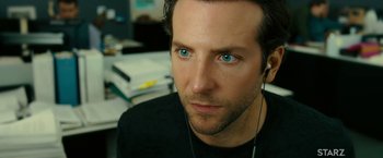 Movie still from “Limitless” (2011), directed by Neil Burger – A person wearing a black shirt; Close Up shot, Over the shoulder angle