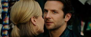 Movie still from “Limitless” (2011), directed by Neil Burger – A man and a woman face to face with one of them touching his face; Close Up shot, Over the shoulder angle