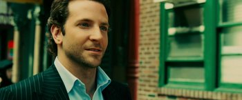 Movie still from “Limitless” (2011), directed by Neil Burger – A person wearing a suit and tie; Close Up shot, High angle