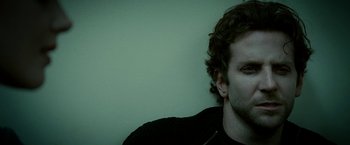 Movie still from “Limitless” (2011), directed by Neil Burger – A person wearing a black shirt; Close Up shot, High angle