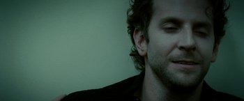 Movie still from “Limitless” (2011), directed by Neil Burger – A man's face in a green room; Close Up shot, High angle