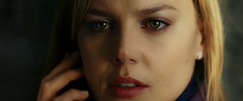 Movie still from “Limitless” (2011), directed by Neil Burger – A woman's face with green eyes; Extreme Close Up shot, Overhead angle