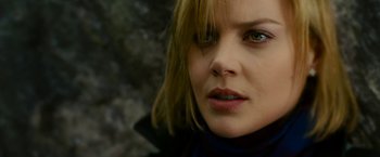 Movie still from “Limitless” (2011), directed by Neil Burger – A woman's face in a black jacket; Close Up shot, Low angle